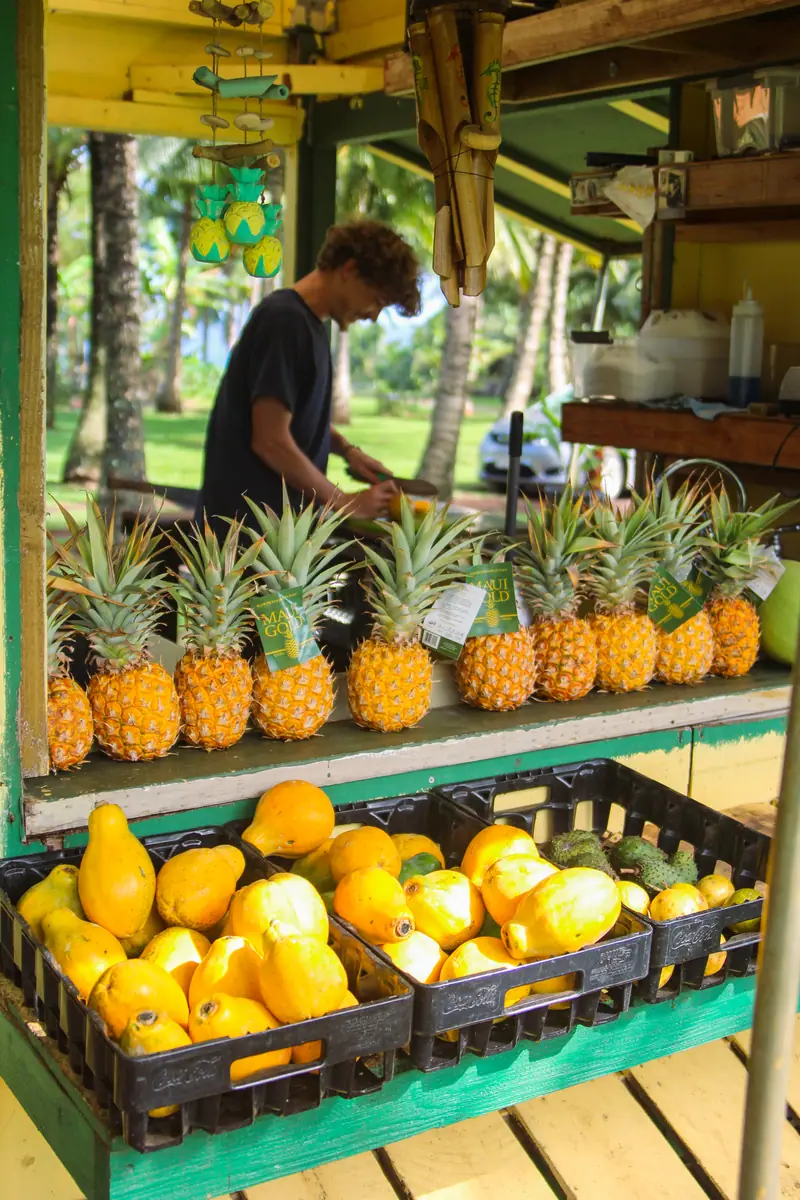 Pineapples and citrus at a roadside fruit stand